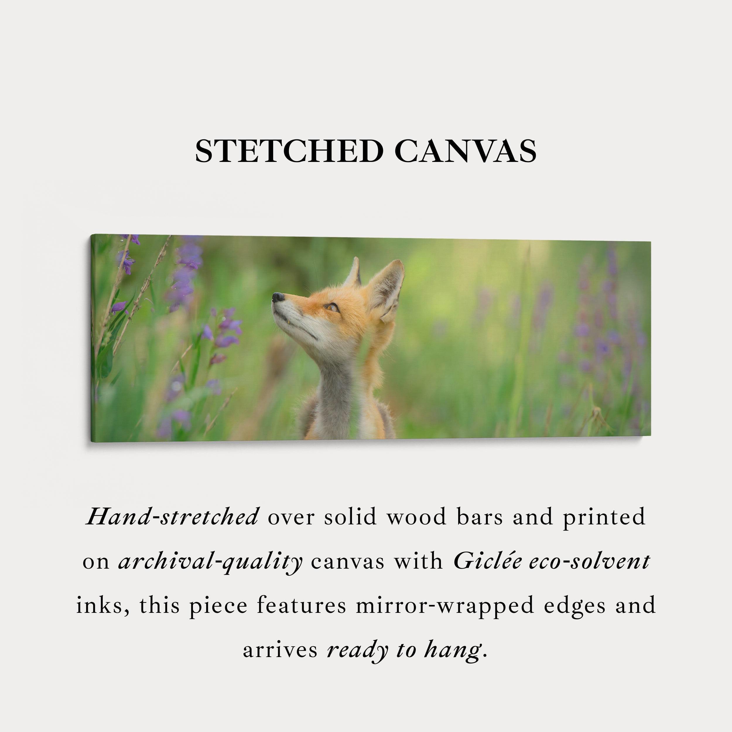 Above bed art fox in meadow looking upward among soft greenery for living room or bedroom